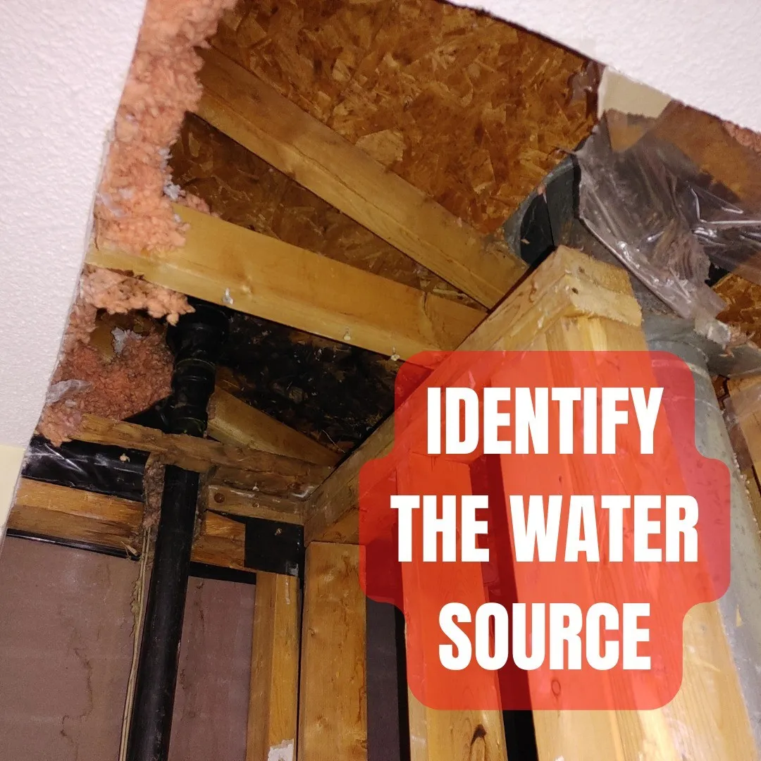 Water-damaged ceiling with exposed wooden beams, wet drywall, and labeled text identifying the water source location